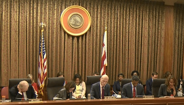 A close up of some of the full council at the vote.