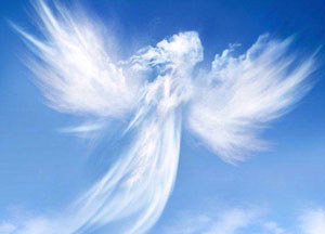 A photo of clouds in the shape of an angel.