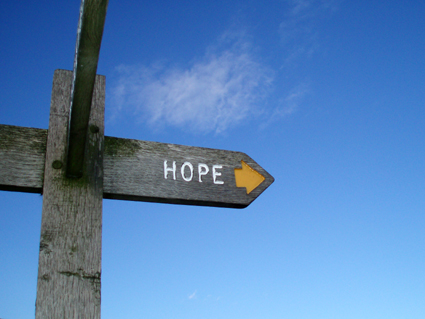 A sign with the word hope on it.