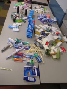 Toiletries and other supplies on the table.