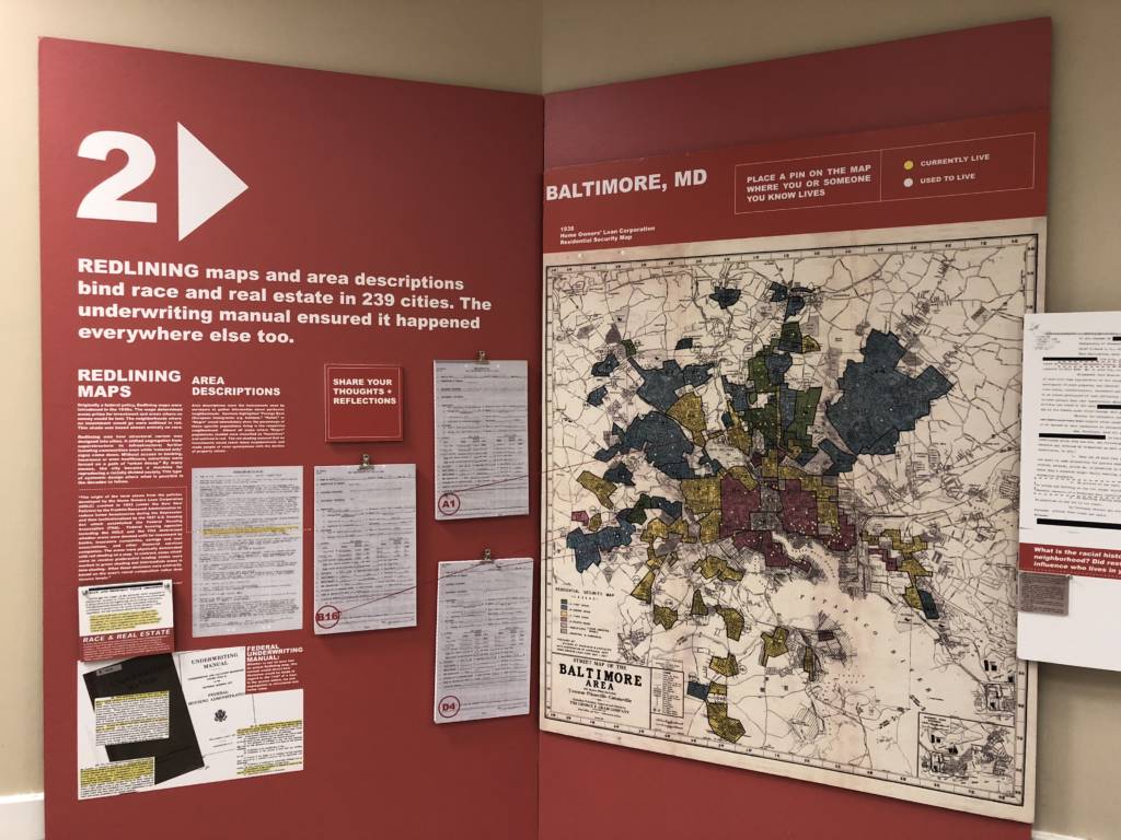 A map of Baltimore, MD circa 1930 color-coded by the Home Owners' Loan Corporation designates the color red to neighborhoods considered "hazardous."
