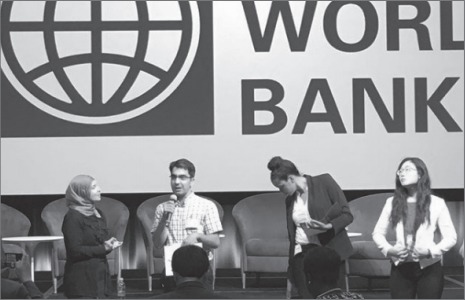 Ilyas Muhammad (second from left) discussed these topics at an Aug. 17 World Bank forum.