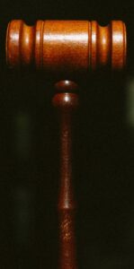 Photo of a courtroom gavel.