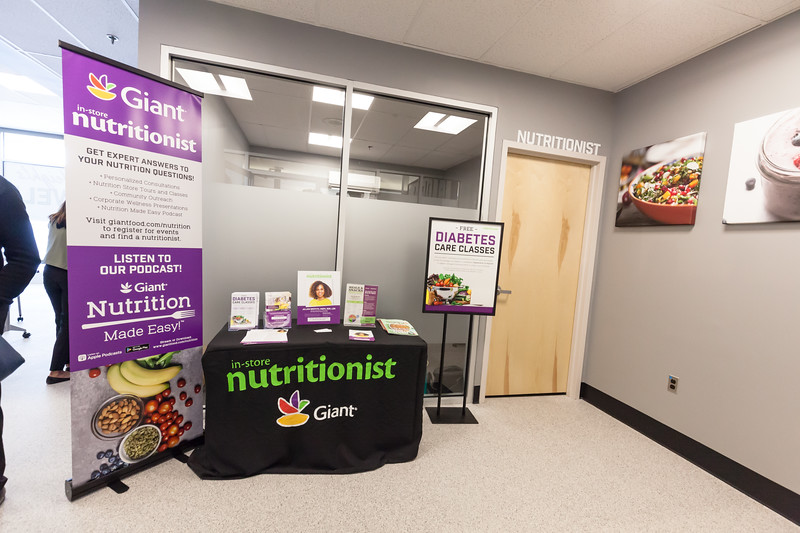 Photo of an office in the Giant store labeled "nutritionist" with promotional materials set out in front of it.