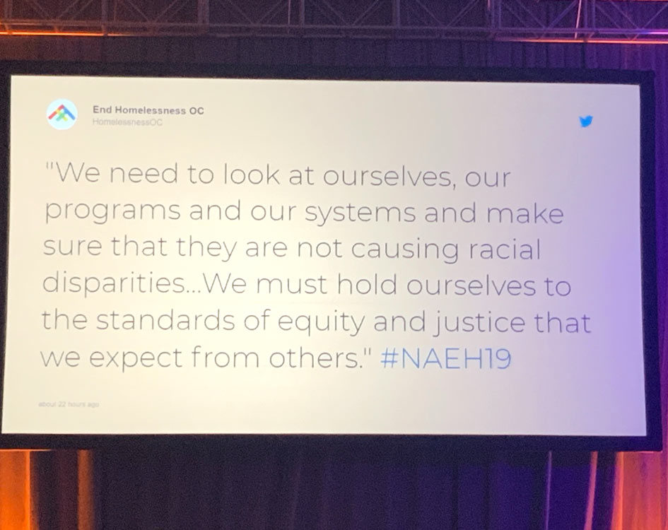 A message saying "We need to look at ourselves, our programs, and our systems and make sure that they are not causing racial disparities...We must hold ourselves to the standards of equity and justice that we expect from others." #NAEH19
