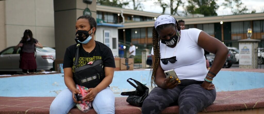 BLM protesters sitting outside the Days Inn