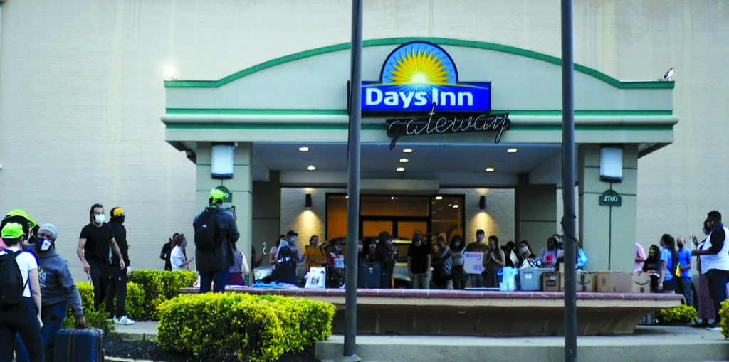 Crowd of protesters gathered at the Days Inn