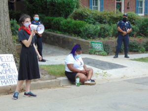 Photo of Astrid Lundberg addressing protesters