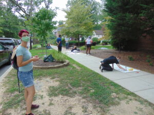 Photo of protesters making signs.