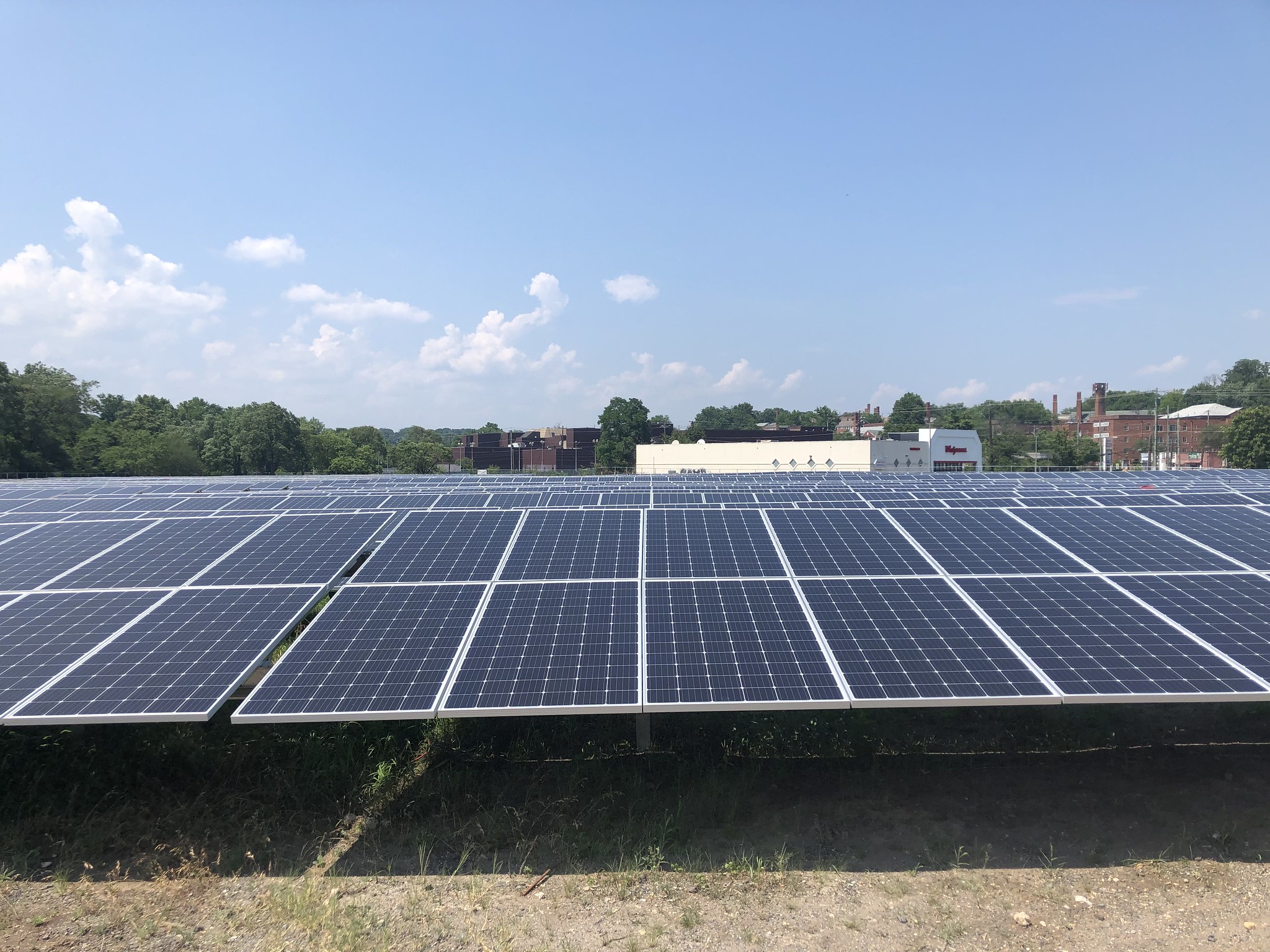 A row of solar panels outside.