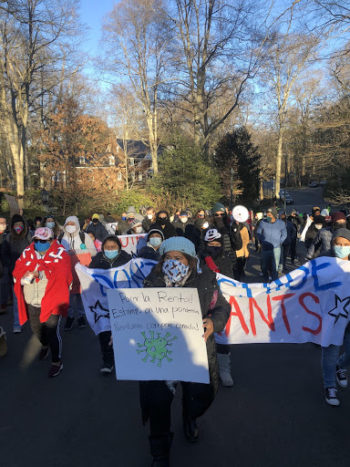 photo of protesters marching to Susan Rice's house