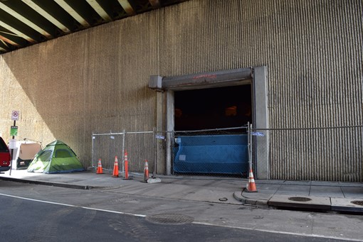 Photo showing a blocked-off doorway on 1st Street NE