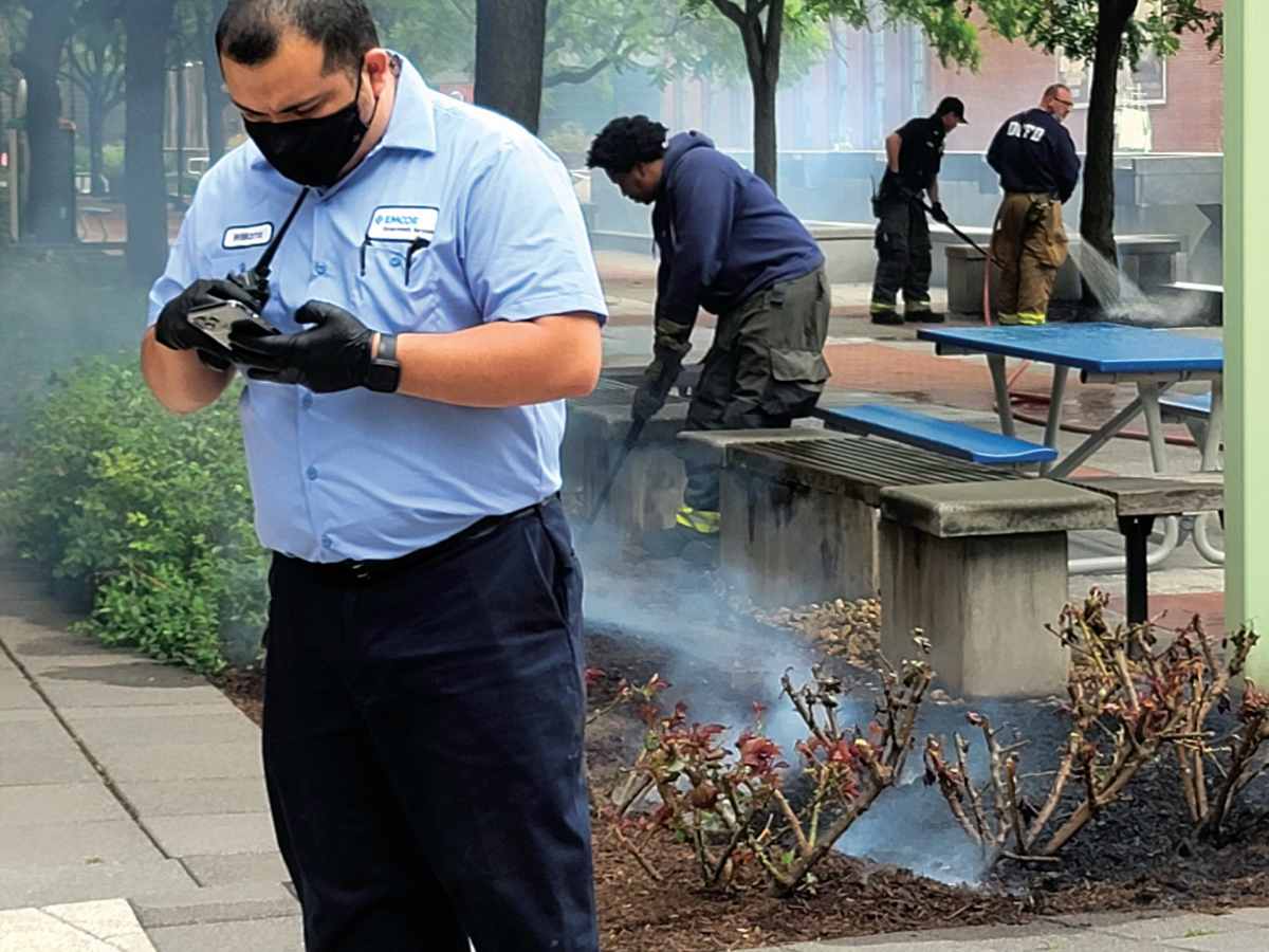 An fire department official writing a report about the fire.