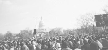 Masses of people gather for Inauguration with the US Capitol in the background