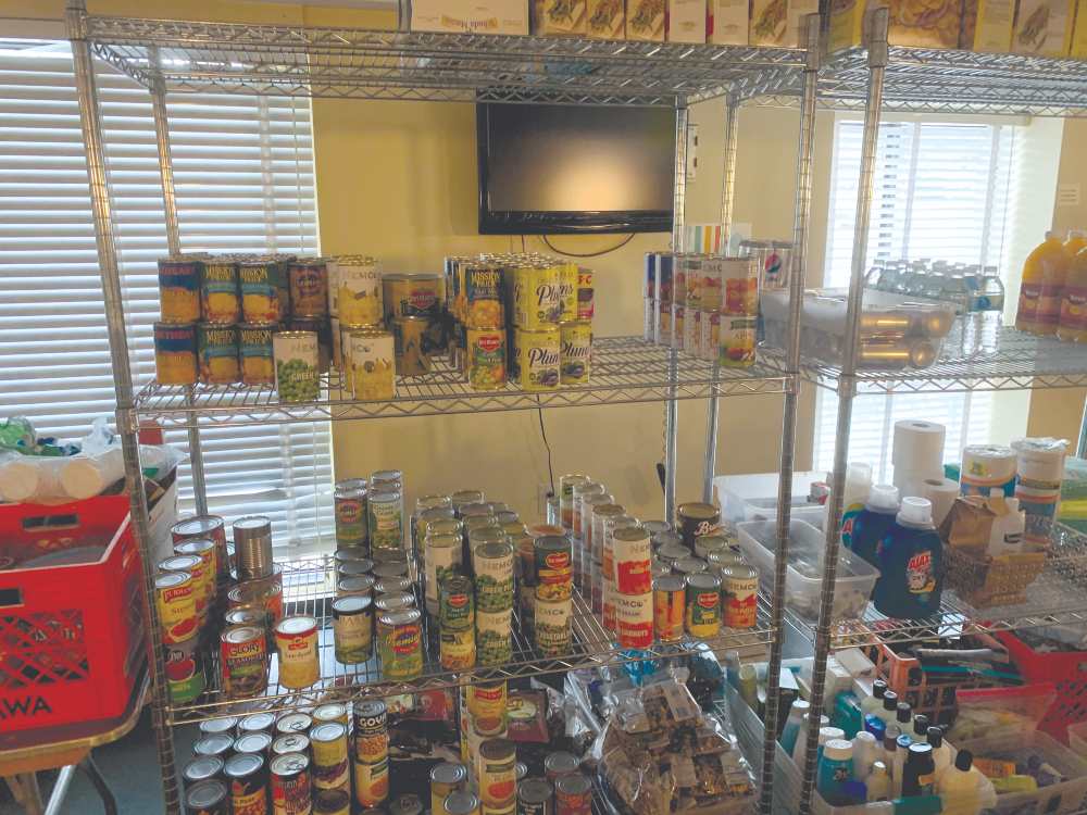 Photos of canned and other groceries on the Knight's Pantry shelves.