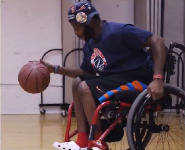 A photo of Abel dribbling a basketball