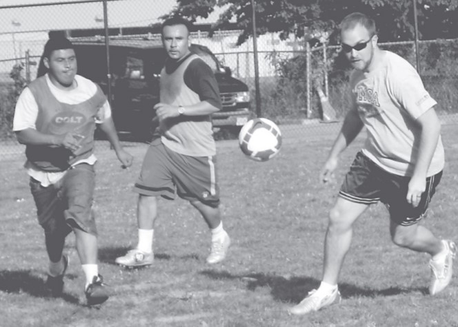 Street Soccer's D.C. Knights' players, volunteers, and coaches practice for their upcoming tournaments.