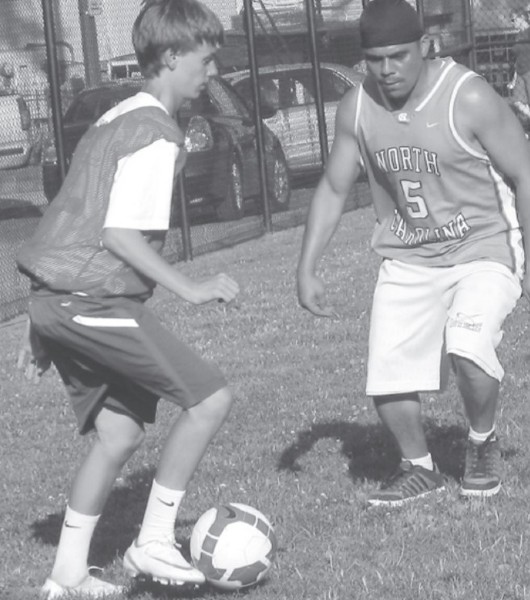Street Soccer's D.C. Knights' players, volunteers, and coaches practice for their upcoming tournaments.