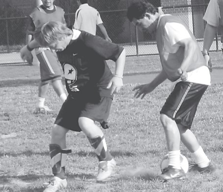 Street Soccer's D.C. Knights' players, volunteers, and coaches practice for their upcoming tournaments.