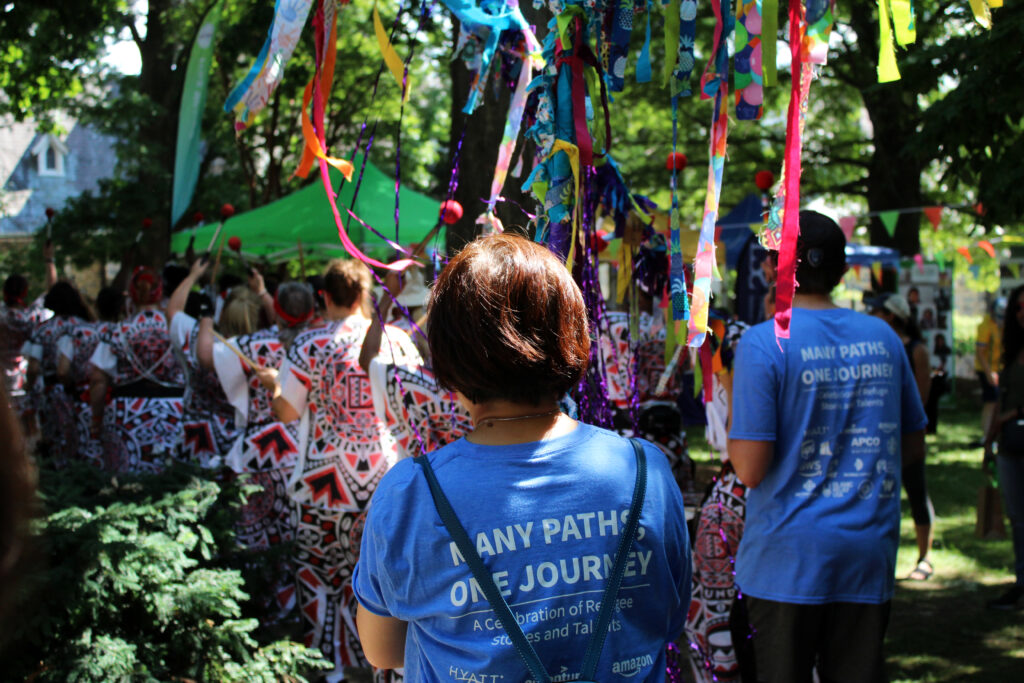 One Journey Festival volunteers march in the Unity Parade.