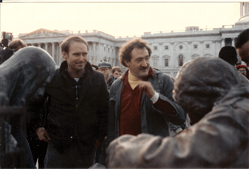 Michael Stoops (left) and Mitch Snyder (right) stand in front of the White House